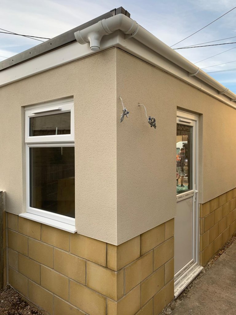 Spray rendered garage in Melksham