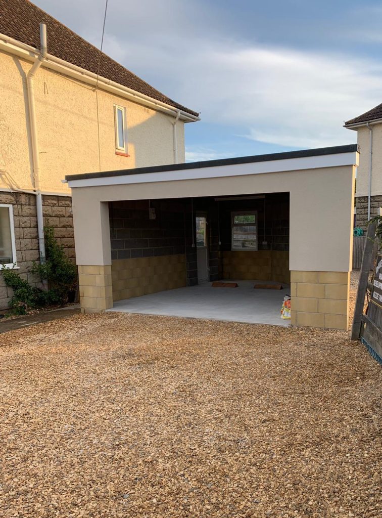 Spray rendered garage in Melksham