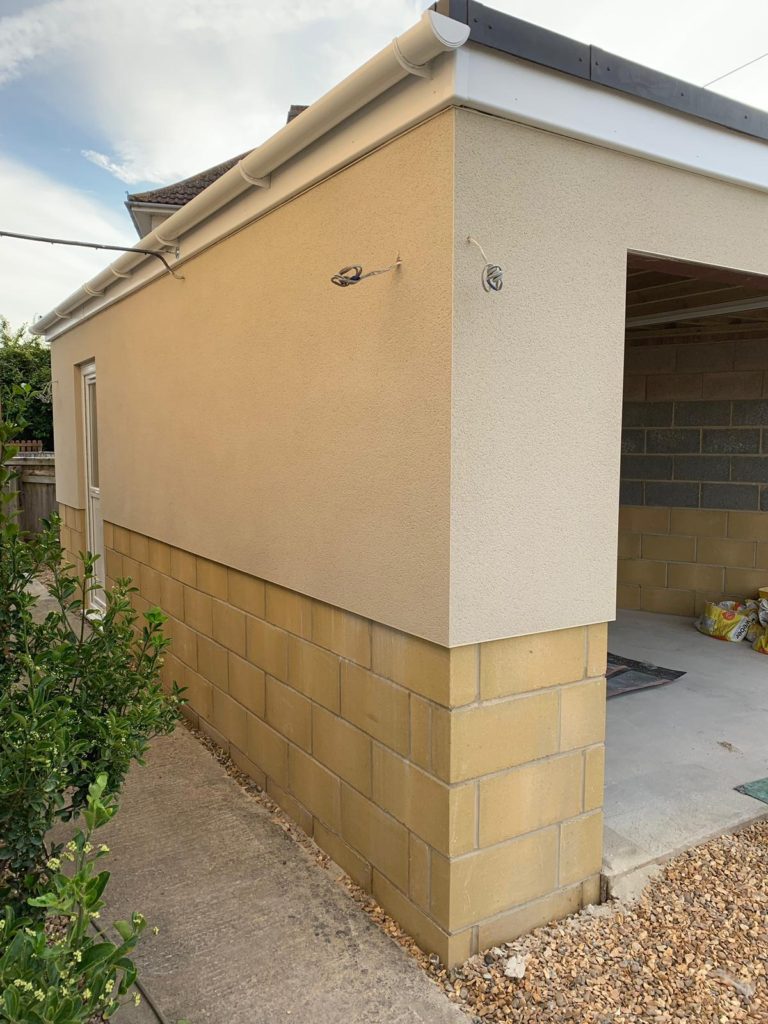 Spray rendered garage in Melksham