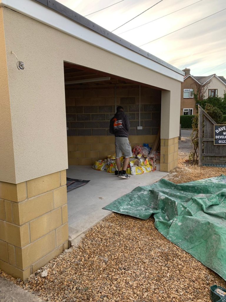 Spray rendered garage in Melksham