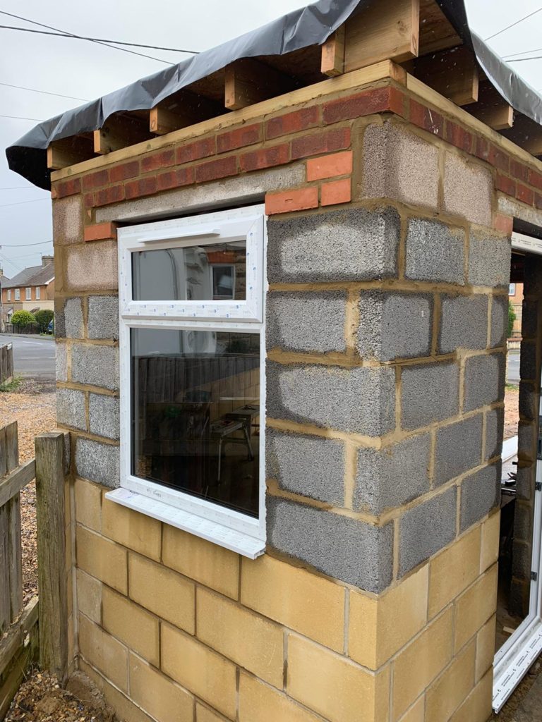 Spray rendered garage in Melksham