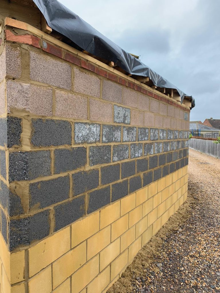 Spray rendered garage in Melksham